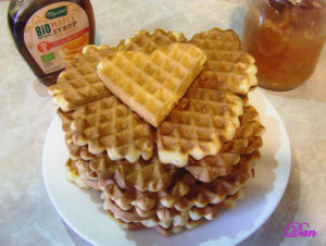 Waffles with maple syrup and jam
